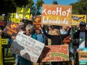 Protesters rally outside the annual general meeting of Woodside Energy in Perth. (Aaron Bunch/AAP PHOTOS)